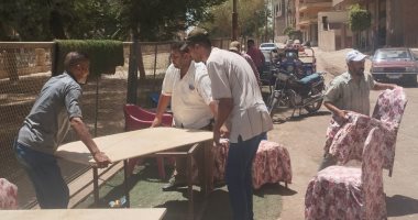 رفع الإشغالات بمنطقة المعلمين بحى غرب أسيوط استجابة لشكاوى المواطنين