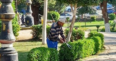 استمرار أعمال النظافة العامة وزراعة الأشجار بأسوان.. صور تهذيب الحدائق