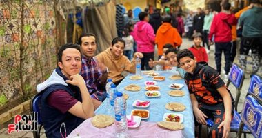 اللمة الحلوة.. شعار أهالى إمبابة مائدة إفطار الـ500 متر فى البصراوى إفطار أهالى إمبابة