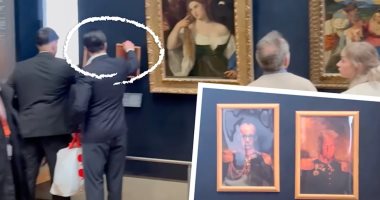 تهريب صورة لترامب وميرز بالزى العسكرى وعرضها بمتحف اللوفر.. شاهد الصور صور ترامب وميرز