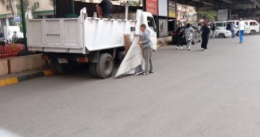 رفع إشغالات للباعة الجائلين والمنشآت التجارية خلال حملات فى الدقى حملات فى الدقى