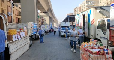 سوق اليوم الواحد بإمبابة يوفر احتياجات المواطنين من السلع الأساسية واللحوم.. صور