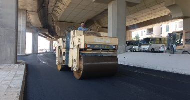 رصف الطريق أسفل الدائرى بمنطقة كفر غطاطى أمام المتحف المصرى الكبير