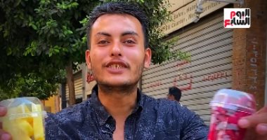عربة فاكهة بشارع شريف.. جواهر استوائية تزين قلب القاهرة