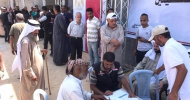 اللجنة المصرية توزع آلاف الطرود