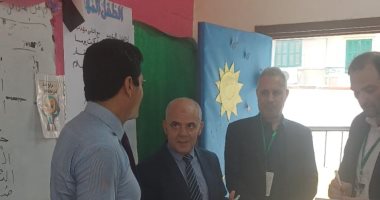 منظمات حقوقية ودولية تتفقد اللجان الانتخابية فى امبابة.. صور