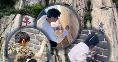 ثنائى صينى يشوه مواقع أثرية بعبارات متفائلة أملا فى تغيير المصير