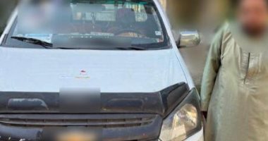 ضبط شخص يوجه الناخبين بمكبر صوت بمحيط لجان الاقصر