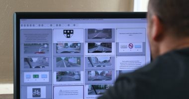 تغريم روسى لارتدائه جاكيت مزود بكاميرا للغش فى امتحان المرور