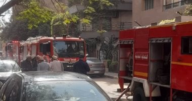 السيطرة على حريق شقة في الدقي دون إصابات.. صور