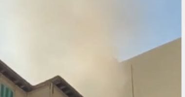 حريق فى عقار سكنى بالدقى والحماية المدنية تحاول السيطرة على النيران.. فيديو