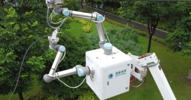 روبوت صينى ينجح فى إصلاح خط كهرباء بجهد 10 كيلوفولت