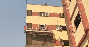 دهان واجهات العقارات على الطريق الدائري