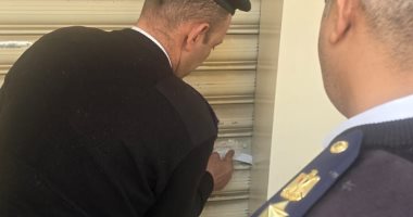 تشميع 5 محلات تعمل دون ترخيص خلال حملة فى قطاع المهندسين بالعجوزة