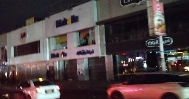 حملات ليلية مكثفة بحى العجوزة لمتابعة التزام المحال بمواعيد الغلق.. صور