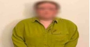 المتهمة عقب إلقاء القبض عليها