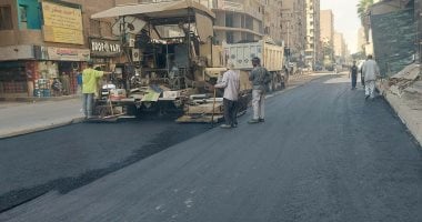رفع كفاءة ورصف شارع ناهيا فى بولاق الدكرور لتحسين الحركة.. صور