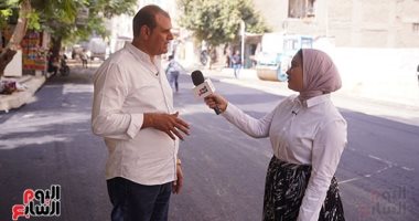 المهندس طه عبد الصادق رئيس حي بولاق الدكرور والزميلة مرام محمد 
