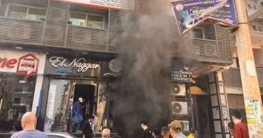 حريق بالدور الأرضي لعقار مكون من 12 طابقا بشارع المحافظة في الزقازيق
