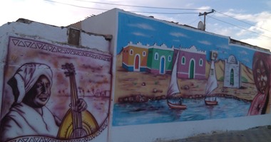 بالصور.. لوحات جرافيتى تزين الشوارع تزامنًا مع تعامد الشمس على "أبوسمبل"