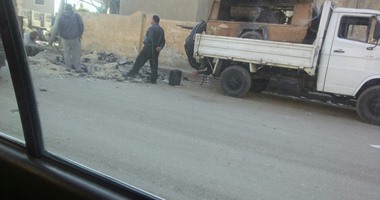 "صحافة المواطن".. محافظة الجيزة تجرى أعمال حفر فى شارع تم رصفه منذ أسابيع