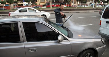 حى الدقى يشن حملة لمنع غسيل السيارات بالشوارع