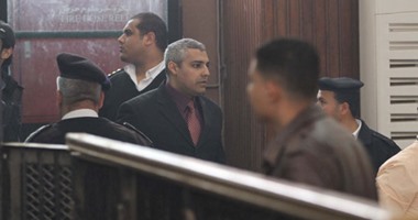 إيداع محمد فهمى ومراسلى الجزيرة قفص الاتهام فى إعادة محاكمتهم بـ"خلية الماريوت"