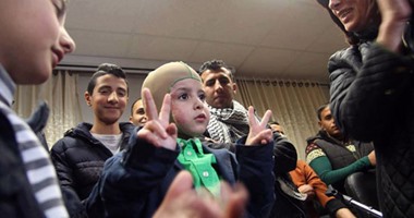 بالصور..الطفل الفلسطينى أحمد دوابشة يصل الأردن للتوجه لإسبانيا للقاء رونالدو