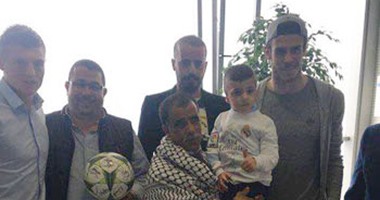 بالصور.. نجوم ريال مدريد فى استقبال الطفل الفلسطينى دوابشة