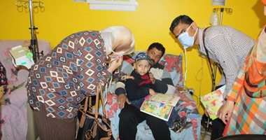 أسرة كلية الصيدلة بجامعة سيناء تزور مستشفى الأطفال 57357