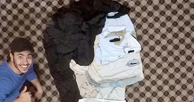 فنان يرسم بورتريه لـ"عبد الحليم حافظ" بالملابس