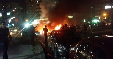 الإخوان يقطعون شارع مكرم عبيد ويشعلون النار فى إطارات السيارات