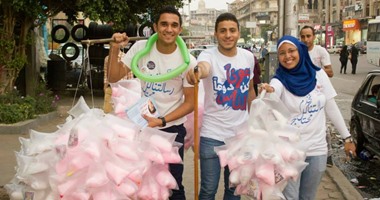 بالصور..أتوبيس"مينى كامب" هيلف شوارع القاهرة تحت شعار"ادعم مستشفى بهية"