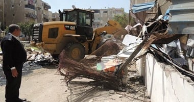 حملات أمنية لإزالة الإشغالات بالضواحى والزهور ببورسعيد