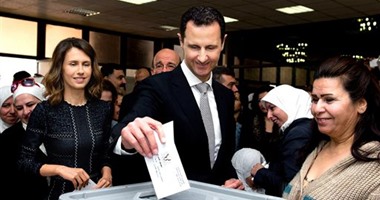 بشار الأسد وزوجته يدليان بصوتيهما فى الانتخابات البرلمانية بسوريا