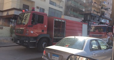 إخماد حريق داخل محل تجارى بشارع الهرم بدون إصابات