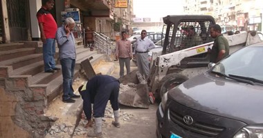 بالصور.. الجيزة تشن حملة نظافة بشارع فيصل وتواصل تركيب صناديق القمامة
