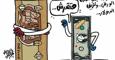 الجنيه الورقى يواجه الدولار فى كاريكاتير "اليوم السابع"