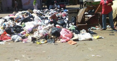 "واتس آب اليوم السابع".. تراكم القمامة بشارع الأقصر فى إمبابة