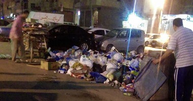 تلال القمامة فى شارع محمد نجيب بالإسكندرية والأهالى يستغيثون بالمحافظ
