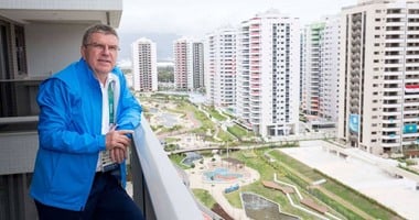 بالصور.. رئيس الأولمبية الدولية ومصر "جيران" فى البرازيل