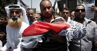 وقفة تضامنية أمام "الصحفيين" للتنديد بحرق الرضيع الفلسطينى