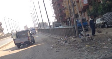 صحافة المواطن.. قارئ يشكو القمامة والتكسير فى مطلع كوبرى العمرانية