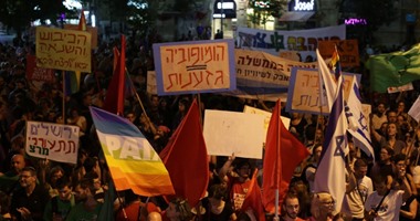 إسرائيليون ومهاجرون ينظمون وقفة فى تل أبيب احتجاجًا على مقتل إريترى