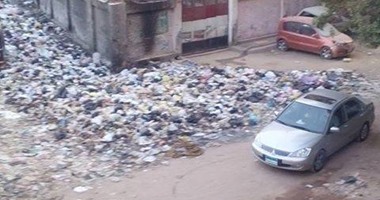صحافة المواطن.. تراكم القمامة بجوار مدرسة بحى السلام بمحافظة القاهرة