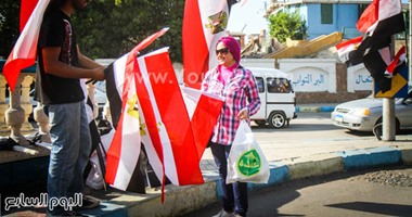 بالصور.. المصريون يرفعون العلم بالمحافظات احتفالاً بقناة السويس الجديدة