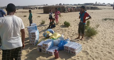 جمعية قرية أمل بالجيزة توزع إعانات على أسر النازحين بشمال سيناء