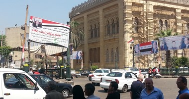 أهالى الدرب الأحمر يجهزون لاحتفالية افتتاح القناة أمام مديرية أمن القاهرة
