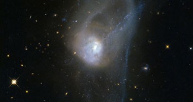 تليسكوب هابل يرصد صورة نادرة لتصادم المجرات فى حركة بطيئة