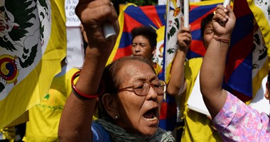 بالصور..مواطنو التبت يتظاهرون فى نيودلهى لمطالبة الصين بالإفراج عن السياسيين